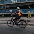 Doctor Philip Moreira, a gynaecologist and department head at Dalal Jamm Hospital, rides his electric bicycle while commuting to the hospital in Dakar, Senegal, 21 October 2024. Reuters/Zohra Bensemra/File Photo