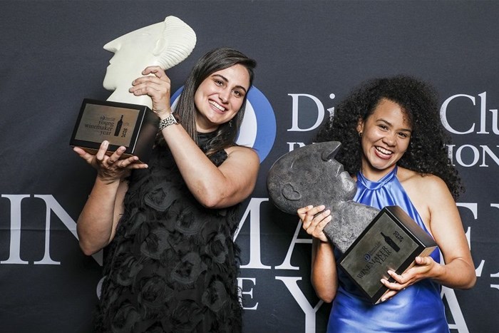 The winners of the 2024 Diners Club Young Winemaker and Winemaker of the Year awards receiving their Trophies - Left: Mika Engelbrecht (2024 Young Winemaker of the Year), and Right: Kiara Scott Farmer (2024 Winemaker of the Year)