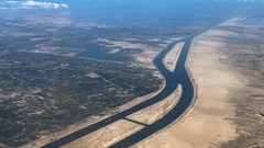 Ships are seen from a plane window, passing through the Suez Canal, Egypt. Source: Reuters/Mohamed Abd El Ghany