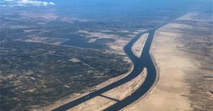 Ships are seen from a plane window, passing through the Suez Canal, Egypt. Source: Reuters/Mohamed Abd El Ghany