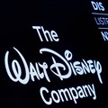 A screen shows the logo and a ticker symbol for The Walt Disney Company on the floor of the New York Stock Exchange (NYSE) in New York, US, 14 December 2017. Reuters/Brendan McDermid/File Photo