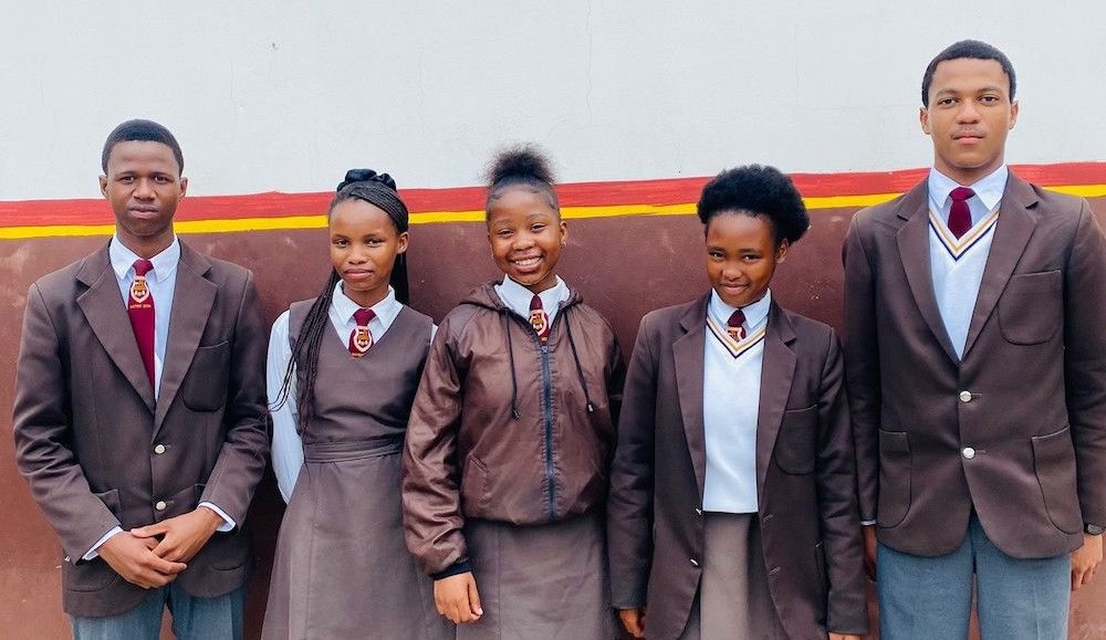 The top five performing learners from Mzomhle Secondary School: Zanisakhe Nxawe, Olwam Bantu, Liyobona Zepe, Zozinini Luvuno, and Hlumile Notununu