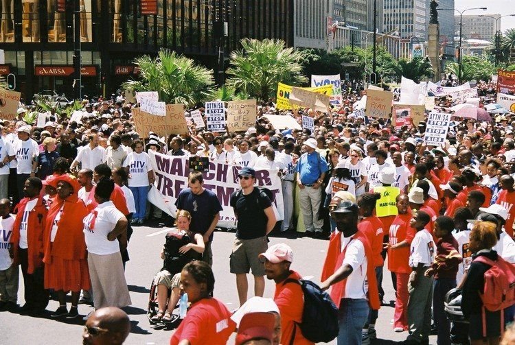 In the 2000s activists across the world campaigned for antiretroviral treatment to be made available to people with HIV. One of the consequences of this was PEPFAR, the United States government’s foreign aid HIV programme. Since 2003 it has saved millions of lives. But now its future is unclear. Photo from the Treatment Action Campaign’s march for HIV treatment in Cape Town on 14 February 2003. (photographer unknown)