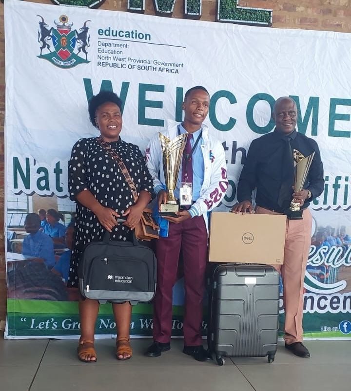 Indiphile Mhkanya with his mother Nomalinge Makubalo and deputy principle Mr Benjamin Metsoamere