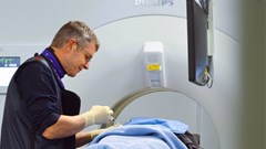 Source: Supplied. Dr Winter performing a CT-guided interventional procedure.