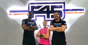 Danette Breitenbach with two of the fantastic F45 coaches, Brandon (left) and Dan (right)