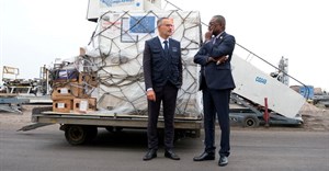 Laurent Muschel, HERA Director General, and Jean Kaseya, Africa CDC Director General, stand near mpox vaccines as first batches arrive at N'Djili International Airport in Kinshasa, Democratic Republic of Congo, 5 September 2024. Reuters/Justin Makangara/File Photo