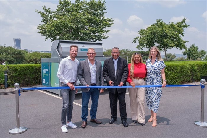 Phillip de Vos – Waterfall City Precinct Manager at Attacq, Doug Woolley – Dell Technologies, Ashley du Plooy – CEO of ERA, Natasha Moyo - Manager Technical Support Services at Dell Technologies and Mischa Tessendorf – Sustainability Project Manager at Attacq cutting the ribbon to celebrate the ERA bin placement at Waterfall Corner Shopping Centre.