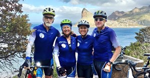 Mouse-Free Marion Cycling Team members John Cooper, Erica Leppan, Katta Ludynia and Jeremy George on the descent from Chapman’s Peak into Hout Bay along the Cape Town Cycle Tour route