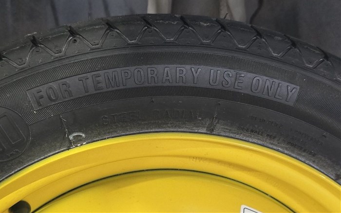 That tiny biscuit spare is only meant for emergencies. When using it, remember to drive at low speed over a short distance. Driving on it too long can be dangerous