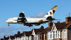 An Etihad Airways plane lands at Heathrow during Storm Isha in London, Britain, 22 January 2024. Reuters/Matthew Childs/File Photo