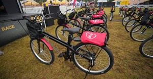 Absa and Qhubeka empower Axios School of Skills students with 100 bicycles