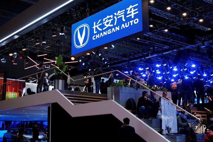 File photo: People visit the Changan Automobile booth during a media day for the Auto Shanghai show in Shanghai, China, on 19 April 2021. Reuters/Aly Song/File Photo