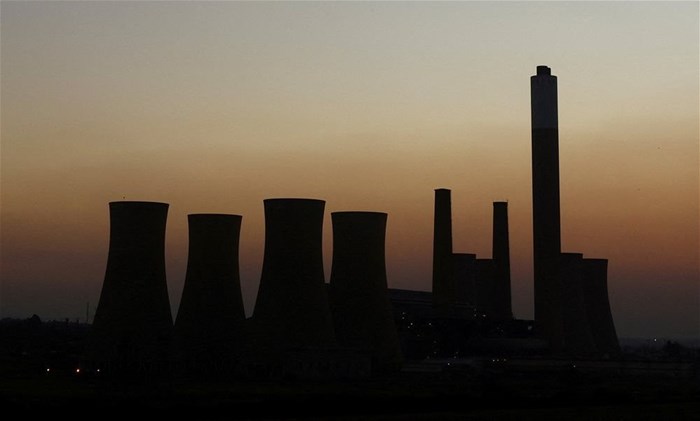 The retired coal-fired Komati Power Station, operated by Eskom, is seen near Komati village, in the Mpumalanga province in South Africa, 9 May 2024. Reuters/Siphiwe Sibeko/File Photo