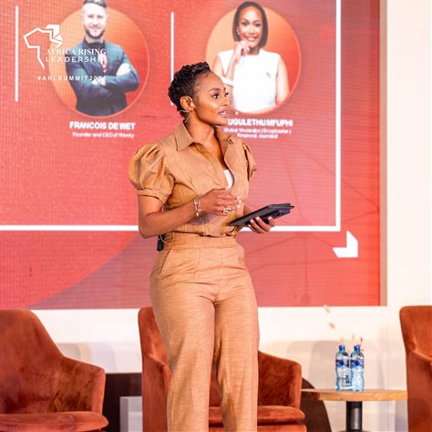 Power FM host and financial journalist Gugulethu Mfuphi engages delegates