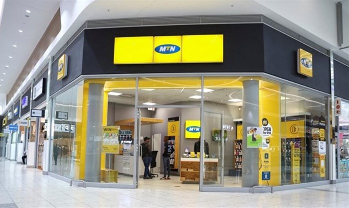 Customers are seen at an outlet of South Africa's MTN Group at the Mall of the South in Johannesburg, South Africa on 4 November 2022. Reuters/Siphiwe Sibeko