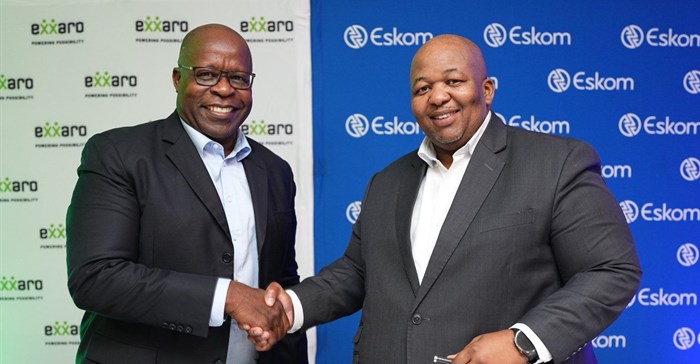 Dan Marokane, group chief executive, Eskom and Ben Magara, CEO of Exxaro Resources. the two organisations have signed a MoU to reduce carbon emissions, improve air quality and ensure a just transition to a low-carbon economy