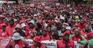 Thousands of teachers march against budget cuts