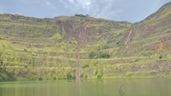 The holistic approach of the Global Industry Standard on Tailings Management (GISTM) re-emphasises the importance of closure planning for mines. Pictured: An open pit mine rehabilitated (Image supplied)