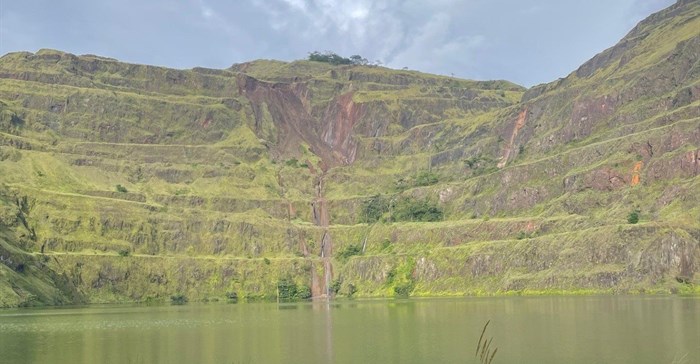 The holistic approach of the Global Industry Standard on Tailings Management (GISTM) re-emphasises the importance of closure planning for mines. Pictured: An open pit mine rehabilitated (Image supplied)