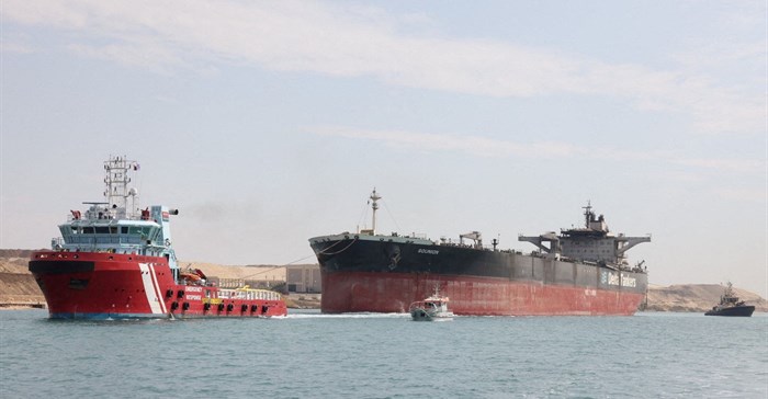 Tugboats help tow the Greek-registered MT Sounion, which was attacked by Yemen's Houthi militants last year in the Red Sea, after it was successfully towed through Egypt's Suez Canal, in Ismailia, Egypt March 10, 2025. The Suez Canal Authority/Handout via REUTERS /File Photo