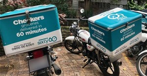 In South African law, gig workers, such as Checkers Sixty60 drivers, are classified as “independent contractors” with limited labour protections or benefits. Photo: Tariro Washinyira / GroundUp