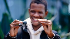 Image supplied. Mr Bright Sello holding the Smart AI Glasses.