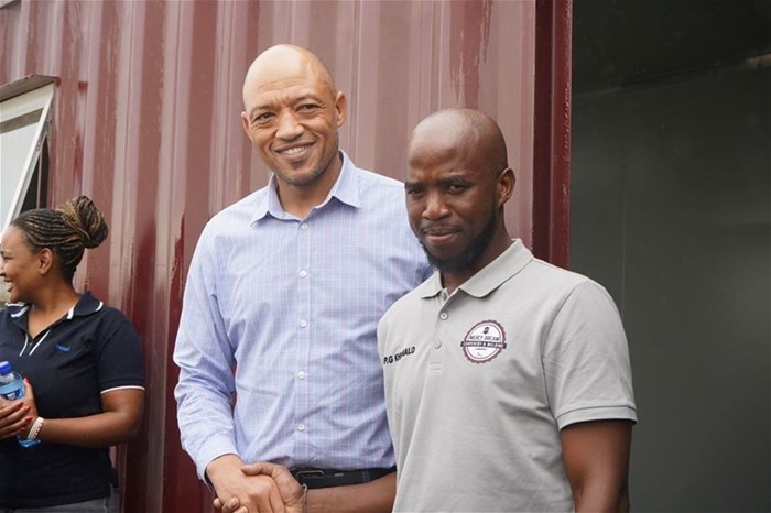 Young entrepreneur Patrick Khumalo's carpentry business is supported by Sappi's ESD programme; seen here with Sappi Forests KZN GM, Mark Barnardo.