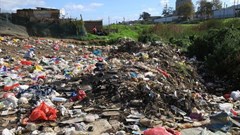 A lack of refuse removal services in Caledon’s Riemvasmaak informal settlement results in waste being dumped at the bottom of the hill on the bank of the Bath River. Riemvasmaak resident Anele Boyce said the dumping problem could be reduced if the municipality supplied bin bags and a skip. Photos: Steve Kretzmann