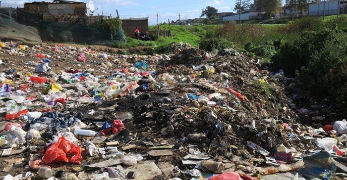 A lack of refuse removal services in Caledon’s Riemvasmaak informal settlement results in waste being dumped at the bottom of the hill on the bank of the Bath River. Riemvasmaak resident Anele Boyce said the dumping problem could be reduced if the municipality supplied bin bags and a skip. Photos: Steve Kretzmann