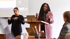 Supplied photo: Sign language interpreter Michelle de Bruyn doing the interpreting as Professor Salome Maswime speaks during a recent event.