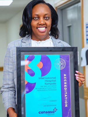 Dr Miriam Mutero proudly displays the Cohsasa accreditation certificate