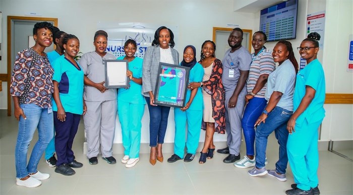 Senior staff and drivers of the accreditation programme celebrate C-Care IHK’s achievement