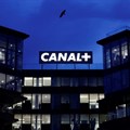 Logos of French TV channel Canal+ are reflected in a puddle in front of the Canal One headquarters of the Canal+ Group in Issy-Les-Moulineaux near Paris, France, 20 February 2025. Reuters/Abdul Saboor/ File Photo