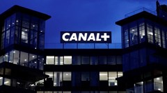Logos of French TV channel Canal+ are reflected in a puddle in front of the Canal One headquarters of the Canal+ Group in Issy-Les-Moulineaux near Paris, France, 20 February 2025. Reuters/Abdul Saboor/ File Photo