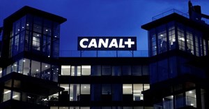 Logos of French TV channel Canal+ are reflected in a puddle in front of the Canal One headquarters of the Canal+ Group in Issy-Les-Moulineaux near Paris, France, 20 February 2025. Reuters/Abdul Saboor/ File Photo