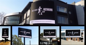 Johnnie Walker’s iconic striding man stops walking to encourage men to pause, reflect, and rest during Men’s Mental Health Month (Image supplied)