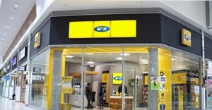 MTN swings to first-half profit, raises guidance