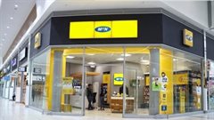 MTN swings to first-half profit, raises guidance