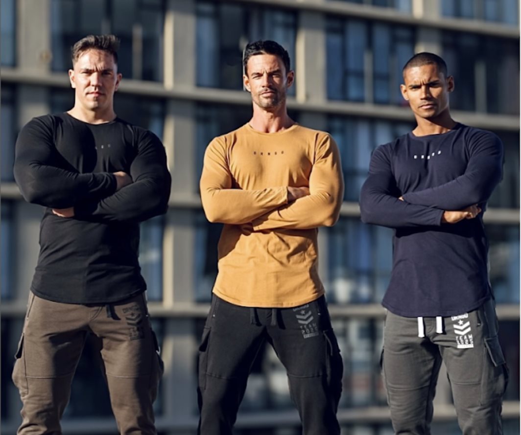 Source: DRNGD. (n.d.). Run the city & dominate winter in the DRNGD longsleeve Elite tee [Photograph]. Retrieved July 21, 2025, from