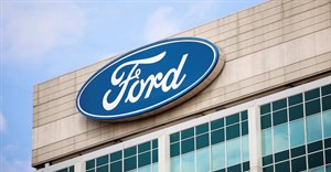A Ford logo is seen on the Ford Motor World headquarters in Dearborn, Michigan, US, 12 March 2025. Reuters/Rebecca Cook/File Photo