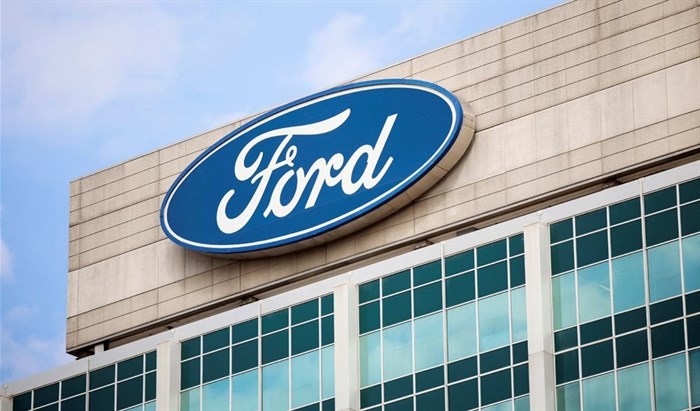 A Ford logo is seen on the Ford Motor World headquarters in Dearborn, Michigan, US, 12 March 2025. Reuters/Rebecca Cook/File Photo