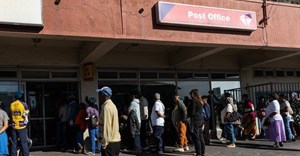 About three million SASSA grant beneficiaries receive their grants through Postbank. Archive photo: Ashraf Hendricks