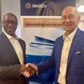 Dr. Nkateko Munisi, new chairperson of MediCo, and outgoing chair, Adv. Barend Esterhuyzen, who founded MediCo CFI in 2015. Image supplied.