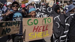 About 200 activists marched to the Constitutional Court in Johannesburg on Tuesday to support Wild Coast communities opposing seismic surveys and oil exploration rights granted to Shell and Impact Africa. Photo: Ihsaan Haffejee