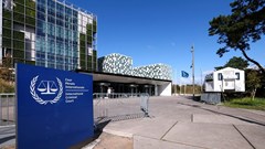 People stand outside the International Criminal Court (ICC), in The Hague, Netherlands, 22 September 2025. Reuters/Piroschka van de Wouw/File Photo