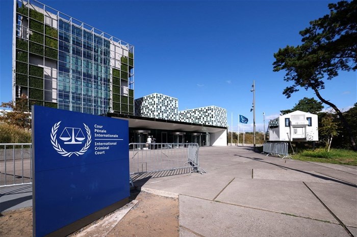 People stand outside the International Criminal Court (ICC), in The Hague, Netherlands, 22 September 2025. Reuters/Piroschka van de Wouw/File Photo