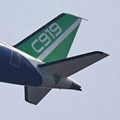 A Comac C919 narrowbody airliner flies in the sky at the China International Aviation and Aerospace Exhibition, or Airshow China, in Zhuhai, Guangdong province, China, 12 November 2024. Reuters/Tingshu Wang/File Photo