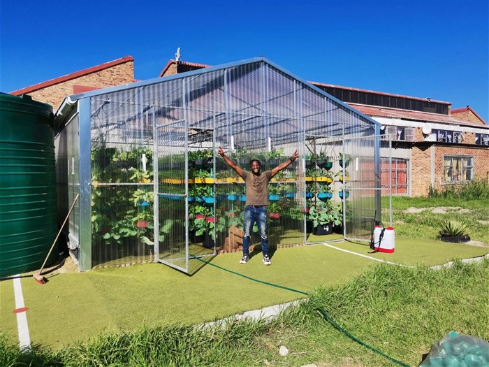 Community gardener Luyanda Mapeyi at Tehillah in Cape Town | image supplied