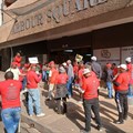 About 50 members of the Food and Allied Workers Union picketed outside the Labour Court on Tuesday. They had applied to interdict South African Breweries (SAB) from retrenching workers. Photo: Silver Sibiya / GroundUp